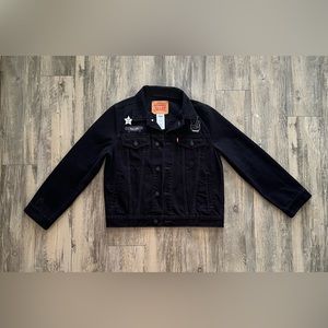 Levi’s Strauss & Co. | Black Jean Jacket
With patches | Button up